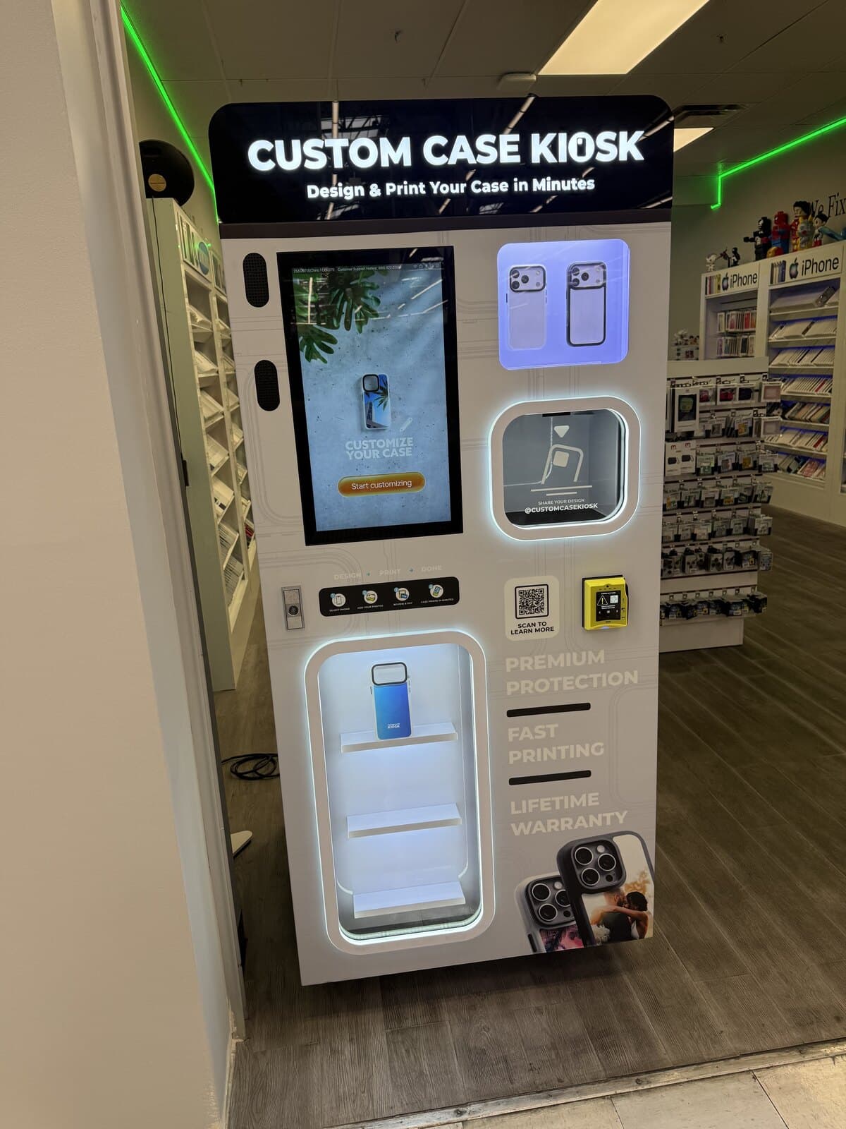 Custom Case Kiosk at iFix and Repair in Chino, CA — the design touchscreen lit up with the Customize Your Case start screen beside the backlit case shelf